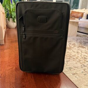 Tumi Black Travel Suitcase